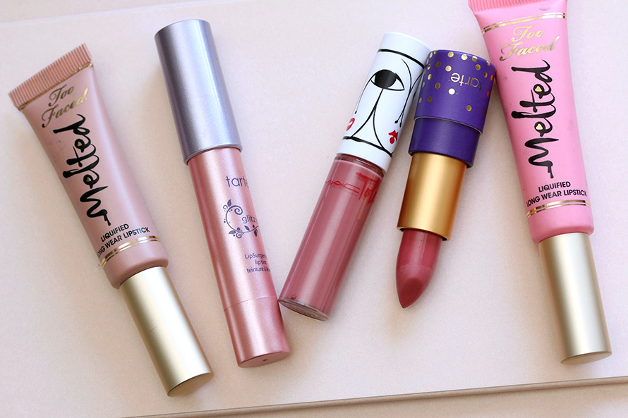 From the left: Too Faced Melted Liquified Long Wear Lipstick in Melted Sugar ($21), Tarte LipSurgence Lip Tint in Glitzy ($24), MAC Toledo Lipglass in Oxblood ($16.50), Tarte Amazonian Butter Lipstick in Ethereal Pink ($16) and Too Faced Melted Liquified Long Wear Lipstick in Melted Frosting ($21)